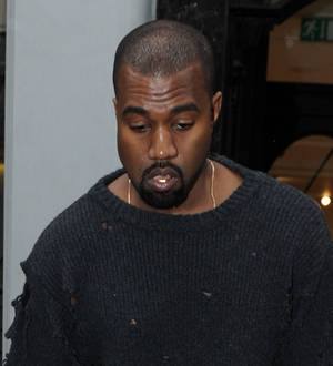 Kanye West gets emotional while paying tribute to fashion mentor