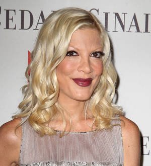 Tori Spelling left sweating during awkward Katie Holmes encounter