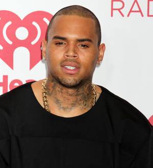 Chris Brown settles two lawsuits