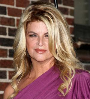 Alley pockets bet for leaving her hair alone in TV interview