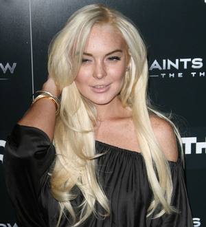 Lohan arrives for morgue duty early