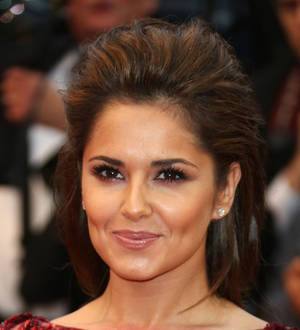 Cheryl Cole visits school in hometown