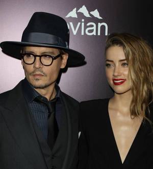 Johnny Depp takes Amber Heard to a book shop for her birthday