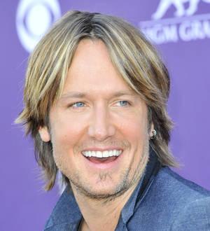 Keith Urban accidentally dragged fan around arena