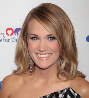 Carrie Underwood weeps as she receives ACM honour