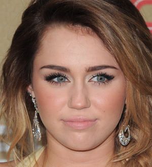 Miley Cyrus and Emma Roberts honour CNN heroes