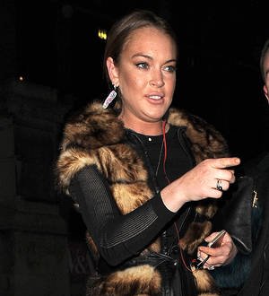 Lindsay Lohan misses charity painting project for court work