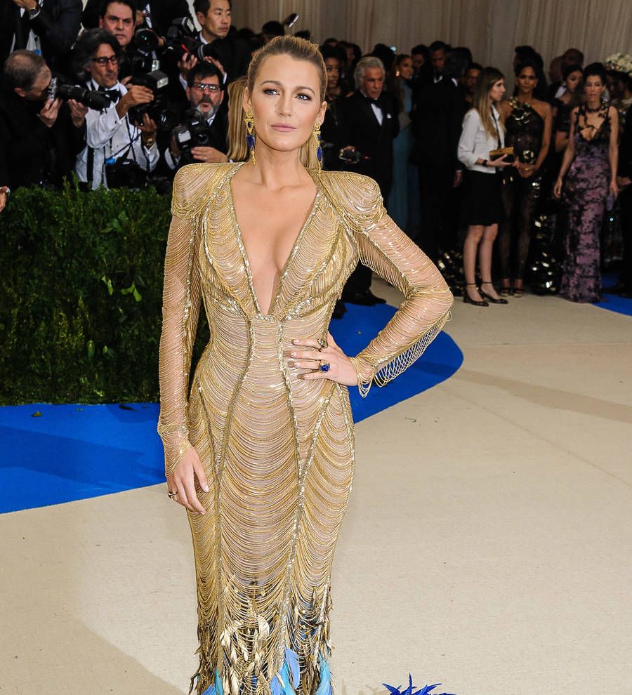 Blake Lively climbing into the cage for MMA film