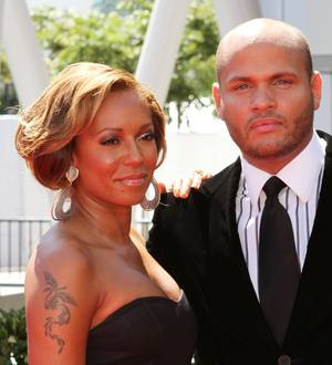 Melanie Brown Defends Husband's Hotel Brawl