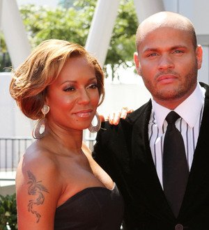 Melanie Brown Defends Husband's Hotel Brawl