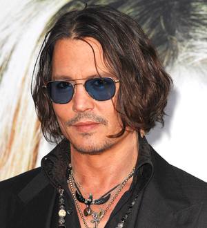 Johnny Depp's fake vampire nails caused toilet difficulty