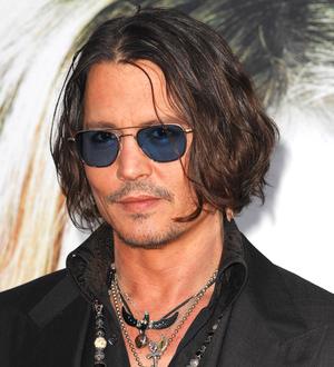 Johnny Depp's fake vampire nails caused toilet difficulty