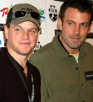Ben Affleck and Matt Damon smile at a hunger relief campaign event