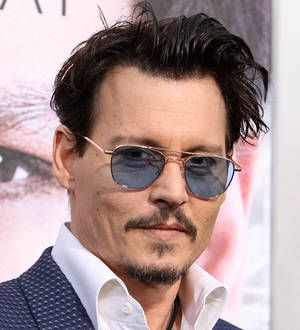 Johnny Depp served with legal papers at film premiere - report