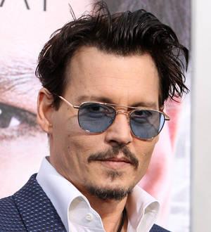Johnny Depp served with legal papers at film premiere - report
