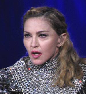 Madonna's son soaked in splash tank on TV