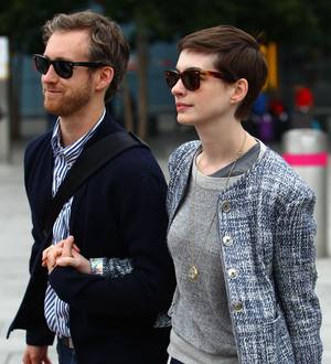 Anne Hathaway and Adam Shulman jet off on honeymoon