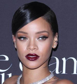 Rihanna's father thrown out of her charity ball