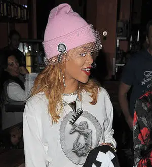 Rihanna courts controversy with joint pictures