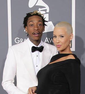 Wiz Khalifa asks Curren$y to be his son's godfather