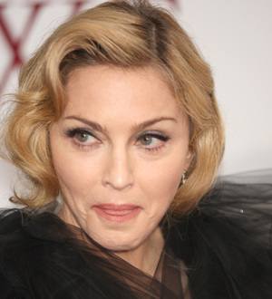 Madonna tears up remembering her late mother