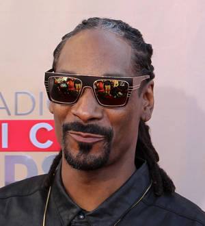 Snoop Dogg raced back from U.K. festival to attend son's graduation