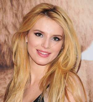 Bella Thorne and Zendaya Coleman pay tribute to writer Chris Thompson