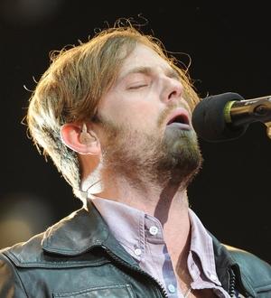 Kings of Leon play concert in the rain