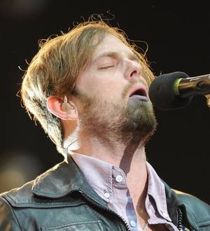 Kings of Leon play concert in the rain