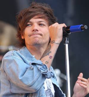 Louis Tomlinson will change his wild ways to run soccer club