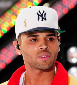 Chris Brown arrives at court with Rihanna
