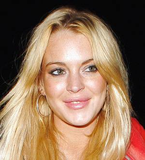 Lindsay Lohan Urges Father to Stay Away
