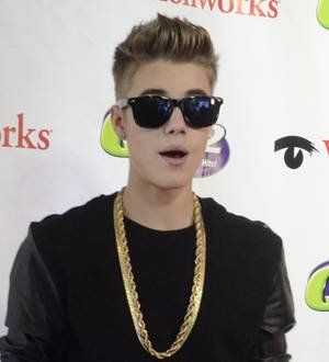 Justin Bieber looks after basketball star's son