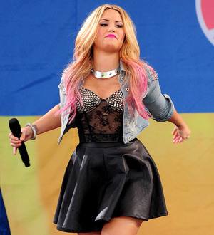 Demi Lovato duets with Nick Jonas onstage in Los Angeles