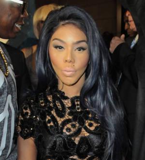 Lil Kim's ex goes on trial for murder and racketeering charges