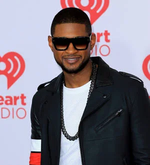 Usher shows off red eye amid reports of New Year's Eve fight