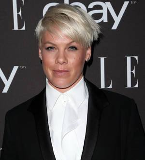 Pink narrowly escapes fall on treadmill