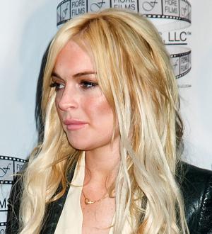 Lindsay Lohan wanted by cheating website bosses