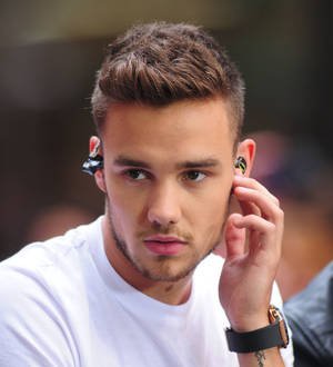 One Direction filmmaker opted not to pry into boys' love lives