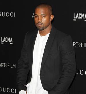 Vogue bosses beat lawsuit over Kanye West and Kim Kardashian video song