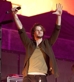 The Wanted hunk wears 'Free Lindsay' shirt at gig