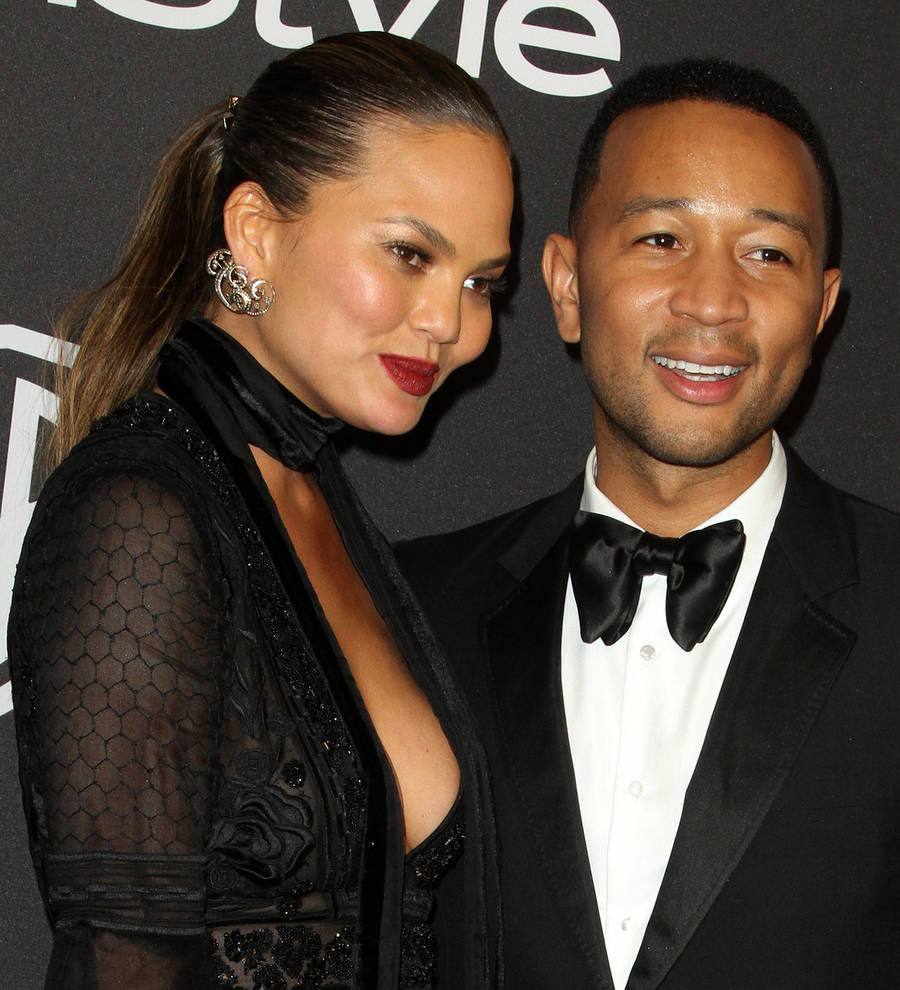 Chrissy Teigen disgusted by racist photographer