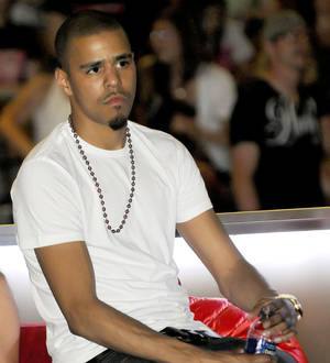 J. Cole shocked by sick fan's gun photo on Twitter