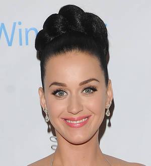 Frozen soundtrack slides back to the top of charts, Katy Perry makes history