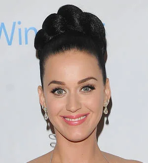 Frozen soundtrack slides back to the top of charts, Katy Perry makes history