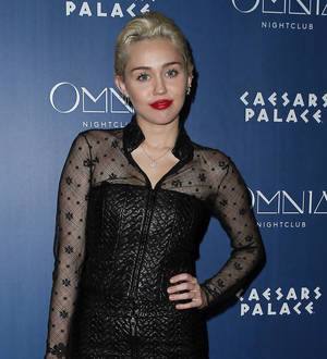 Miley Cyrus sports 'Hemsworth' jersey