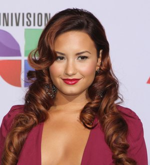 Lovato catches bouquet at Thornton wedding