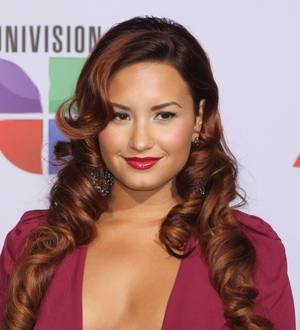 Lovato catches bouquet at Thornton wedding
