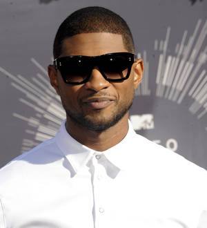 Usher launches reading drive