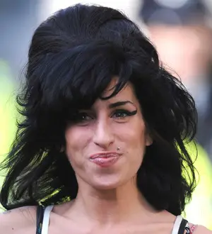 Amy Winehouse's Back to Black dress sold for charity
